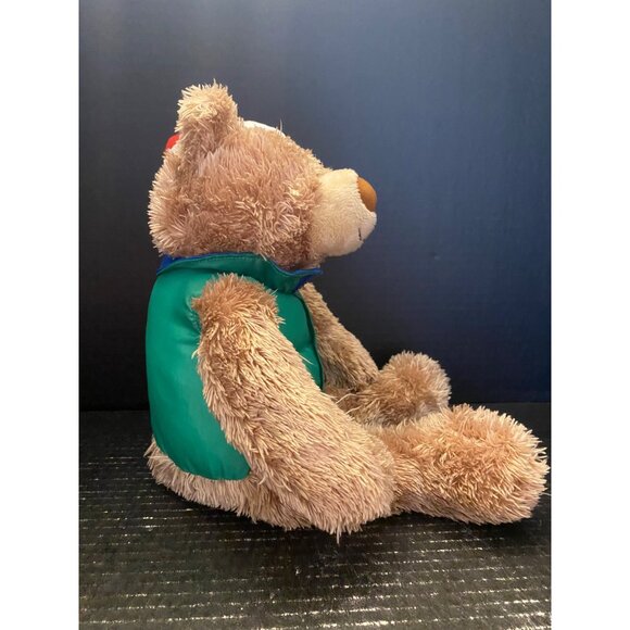 Hallmark Plush North Pole Teddy Bear Stuffed Animal Santa Hat Green Puffer Vest - Picture 3 of 7